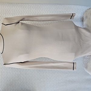 Misguided beige mini sweater dress.